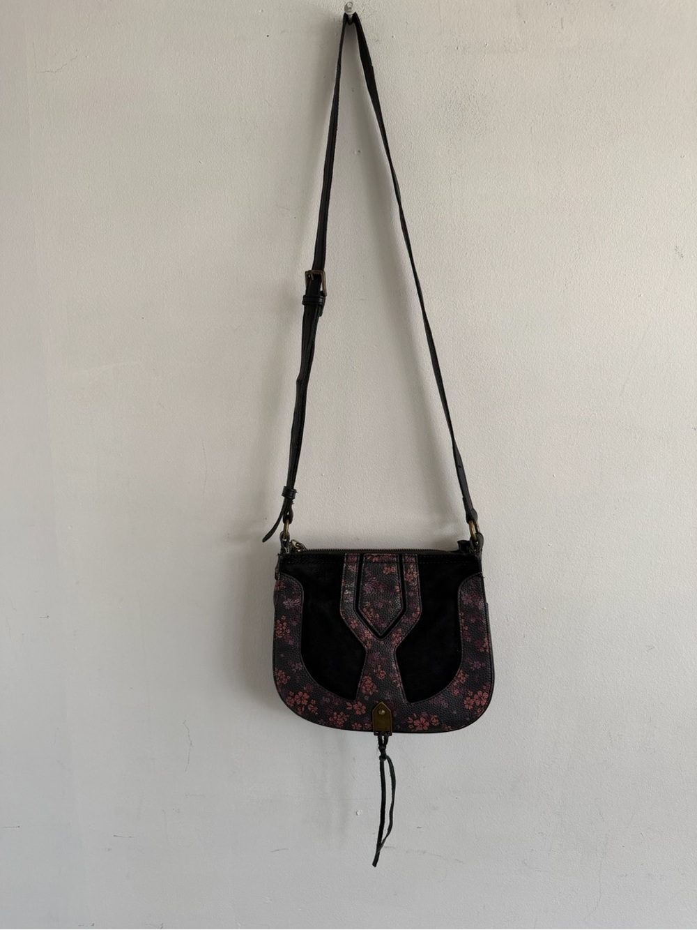 The Sak Black Crossbody Bag with Pink Floral Accents